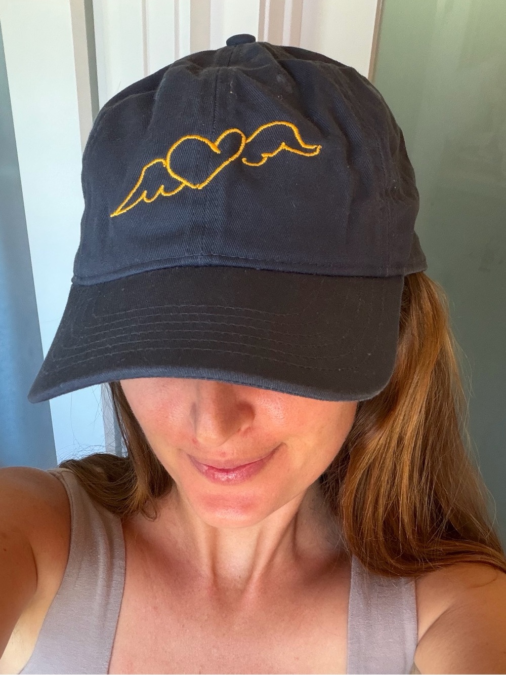 Classic Black Baseball Cap with Yellow Winged Heart Embroidery